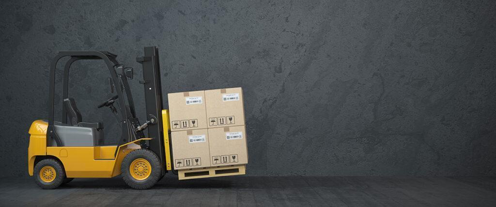 Estimating hot-melt coverage. An image of a forklift with large appliance boxes to show how estimating hot-melt adhesives for large appliances works.