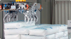 Palletizing adhesive application for load stabilization